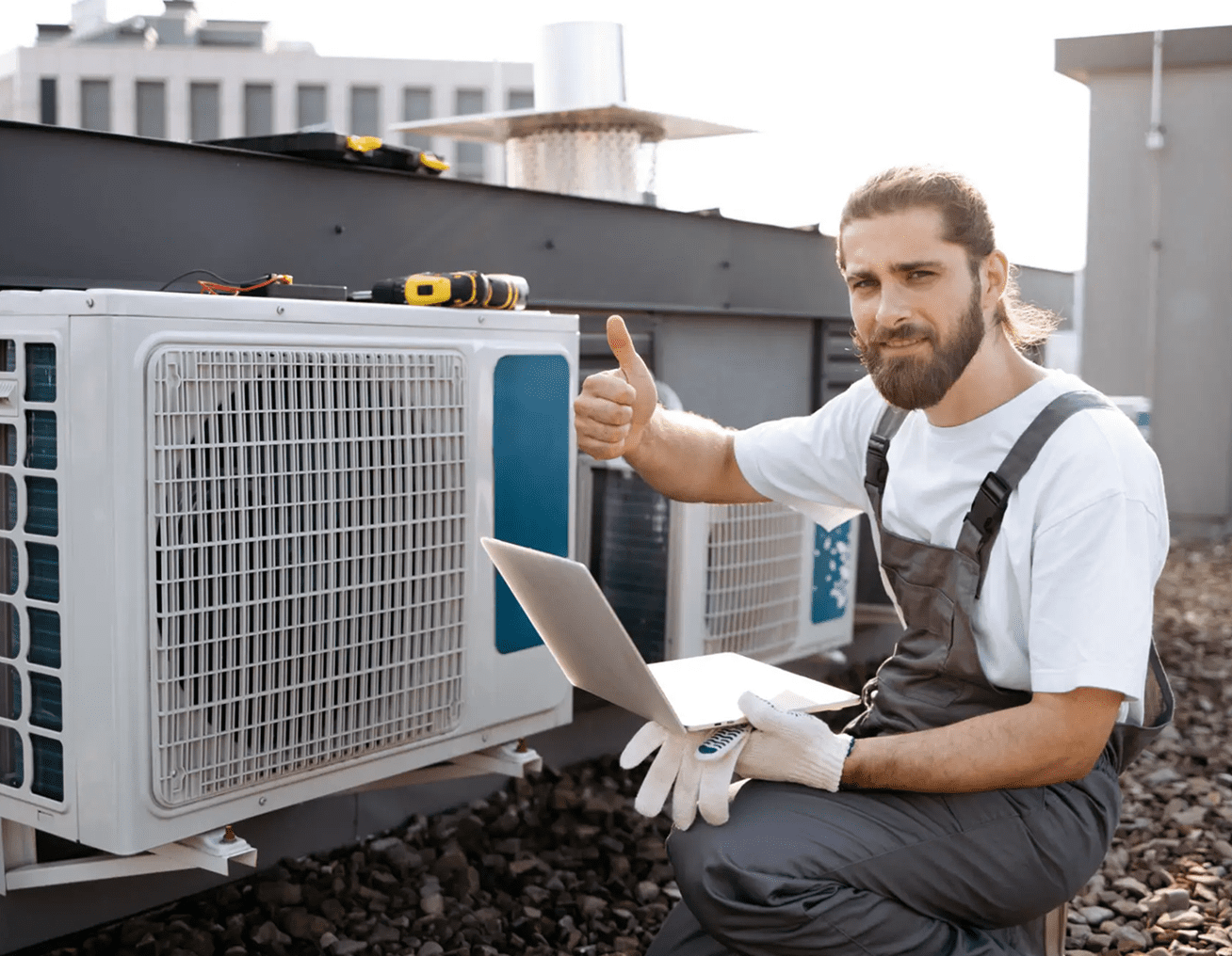 Man giving thumbs up on rooftop